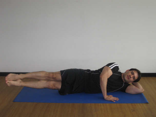 Side Double leg lifts (Elevar de lado las dos piernas juntas)