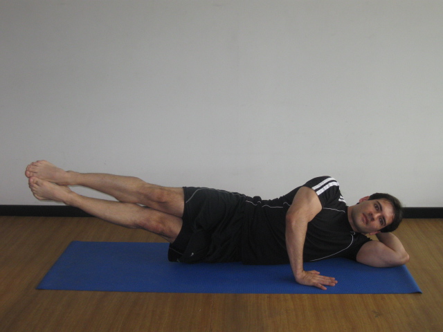 Side Double leg lifts (Elevar de lado las dos piernas juntas)