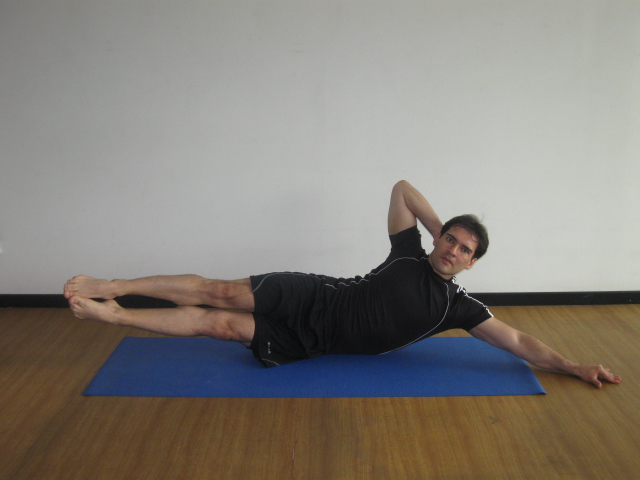 Side Double leg lifts (Elevar de lado las dos piernas juntas)